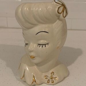 Glamour Girl Head vase ..signed white with gold trim.  Price Firm